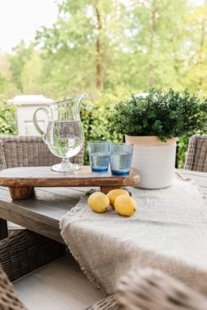 Outdoor table set with artificial flower pot
