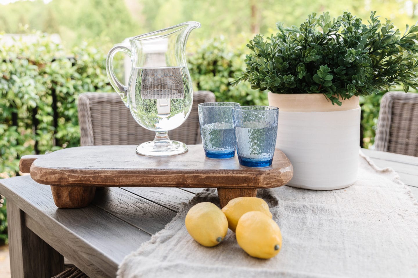 artificial porch plants at a table setting