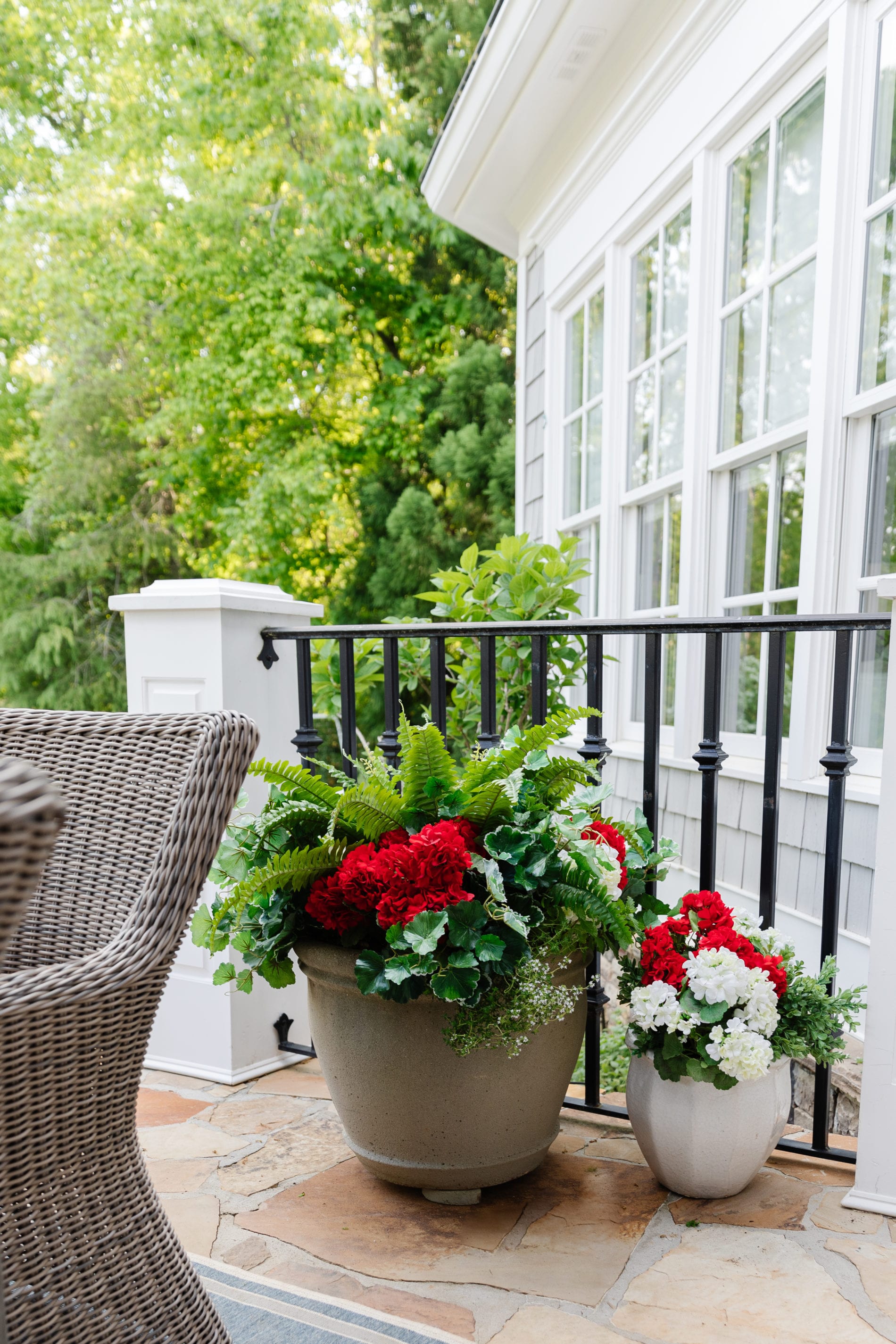 I put fake flowers outside. But can you tell? I dare you! bluegraygal