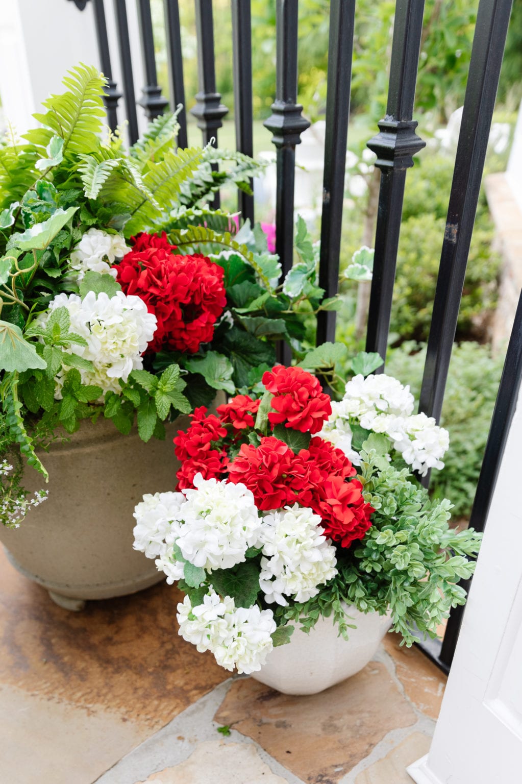 I put fake flowers outside. But can you tell? I dare you! bluegraygal