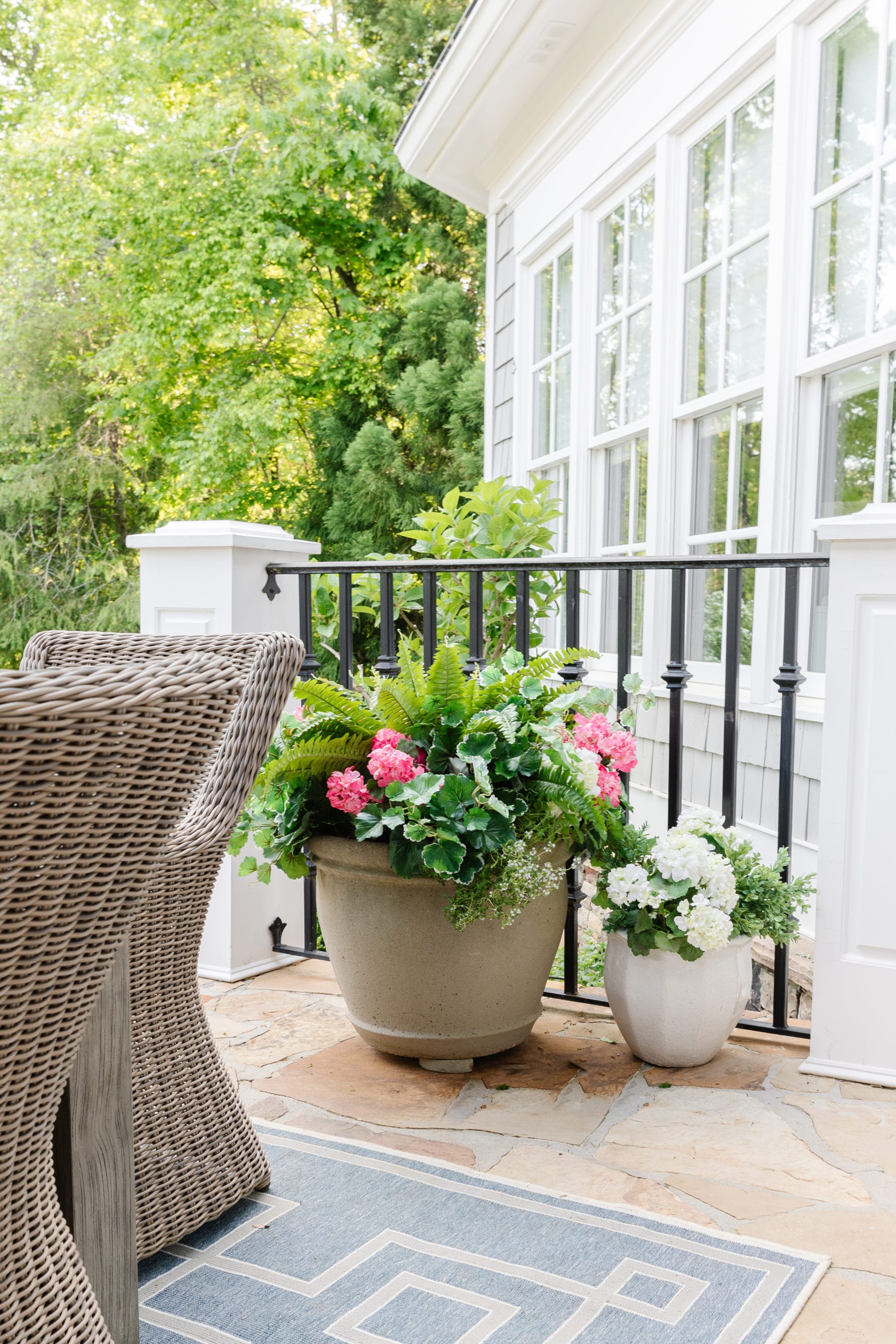 I put fake flowers outside. But can you tell? I dare you! bluegraygal