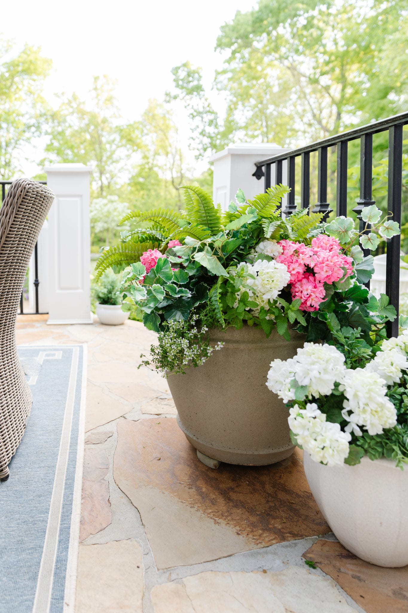 I put fake flowers outside. But can you tell? I dare you! bluegraygal