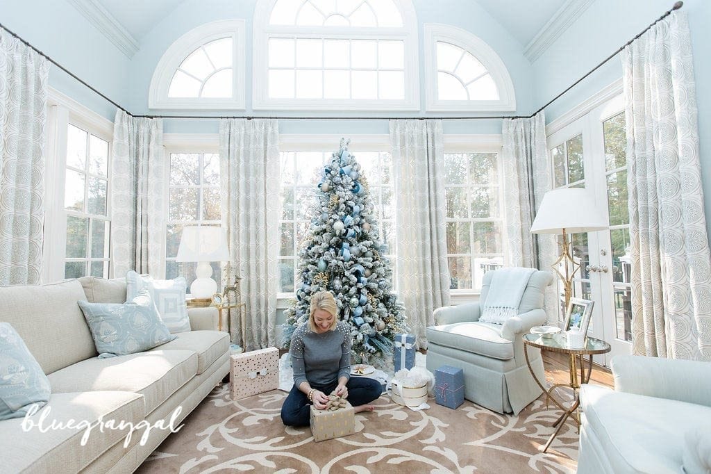 Blue Christmas tree ideas in the home of holiday blogger BlueGrayGal, Kelly Page with blue ribbon and blue glass Christmas ornaments in icy blue room.