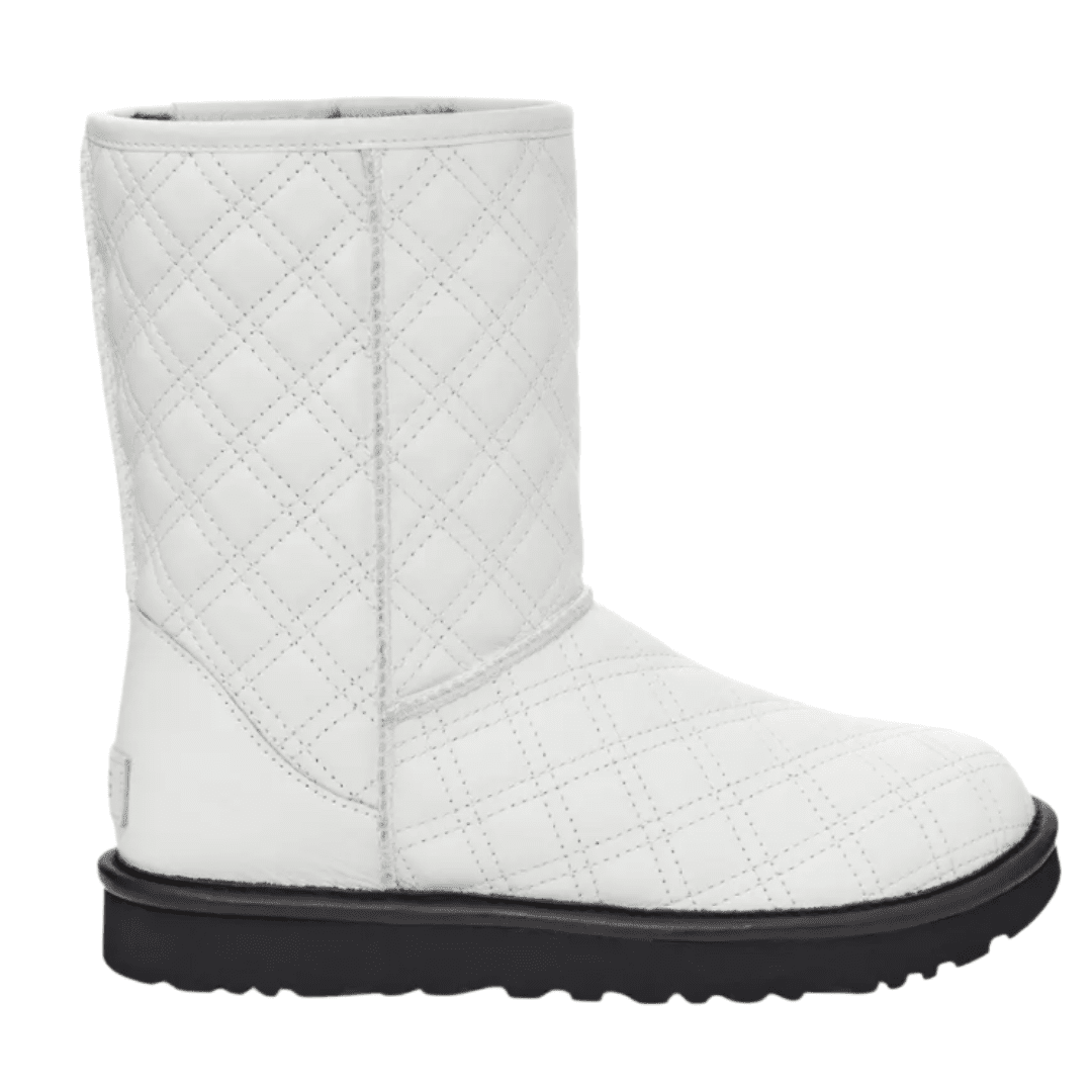 Pull off the crisp winter wonderland look with these white winter boots by UGG. These Designer winter boots have a shearling lining and quilted feel for your footsies. 