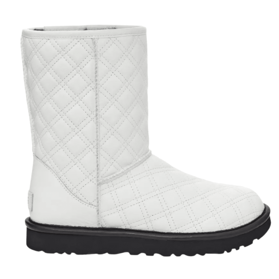 Pull off the crisp winter wonderland look with these white winter boots by UGG. These Designer winter boots have a shearling lining and quilted feel for your footsies.