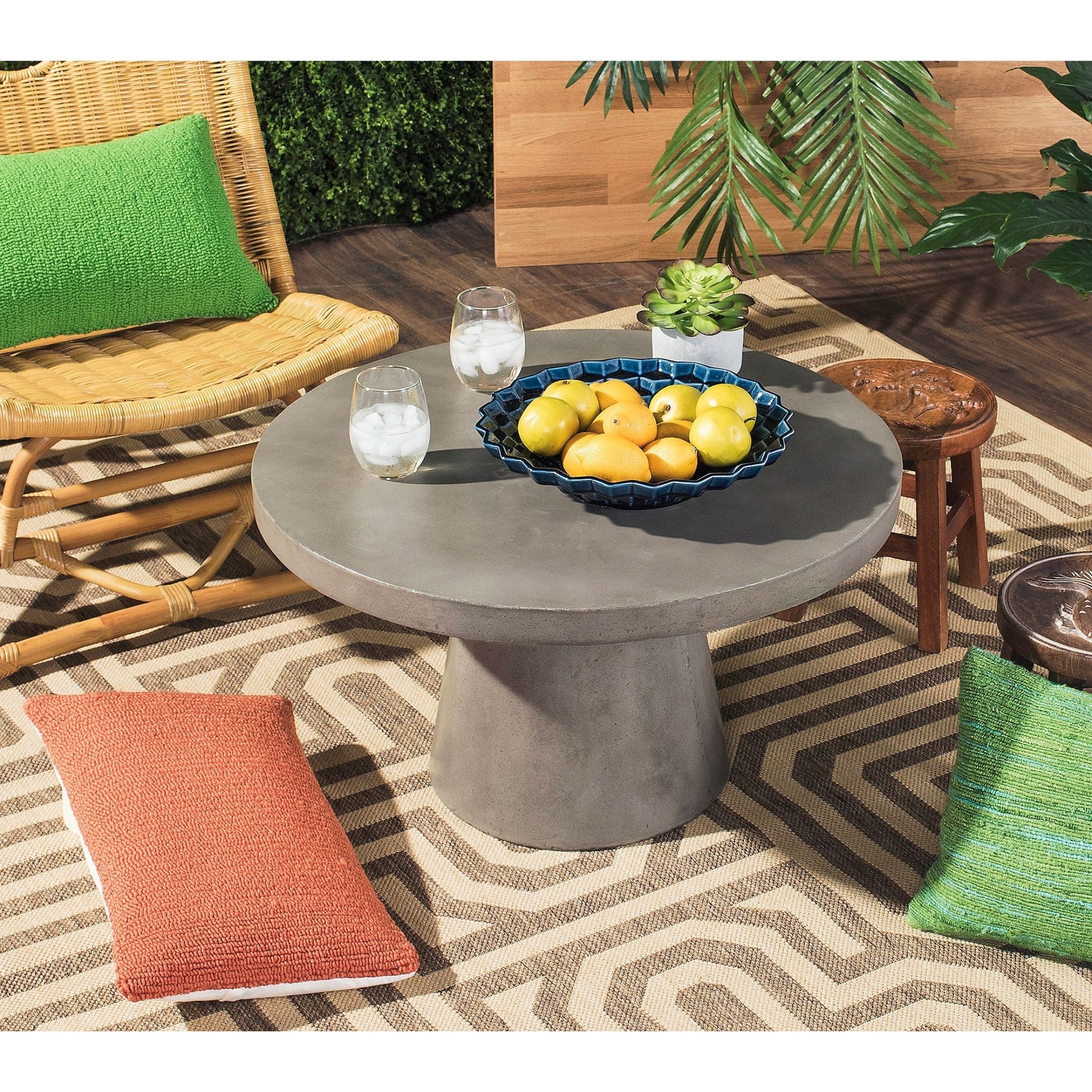 Concrete pedestal coffee table.
