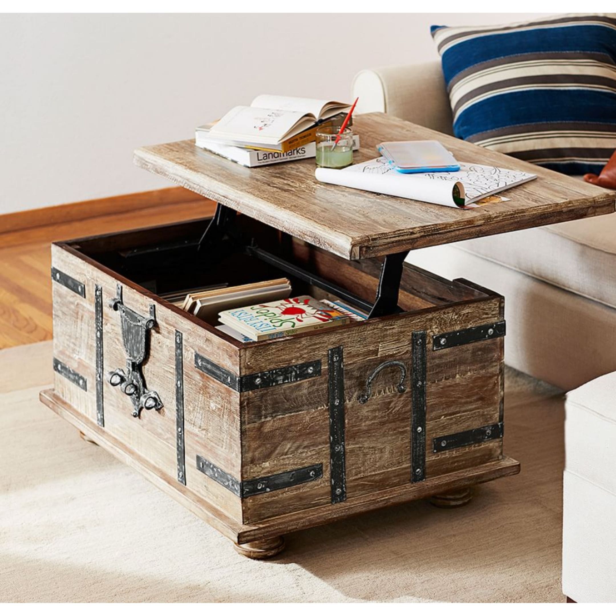 Treasure trunk coffee table with lift top for storage.