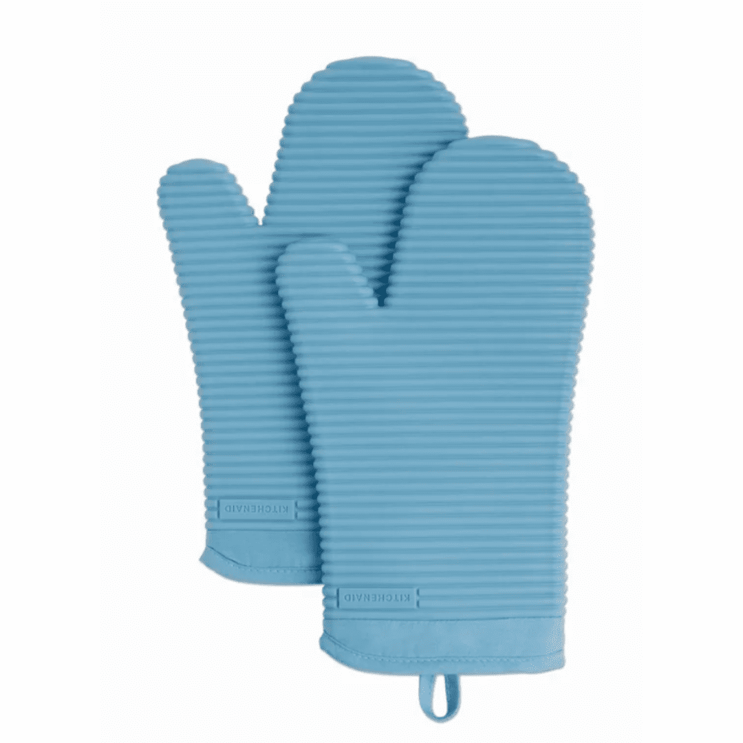 Ribbed silicon blue oven mitts with hanging feature.