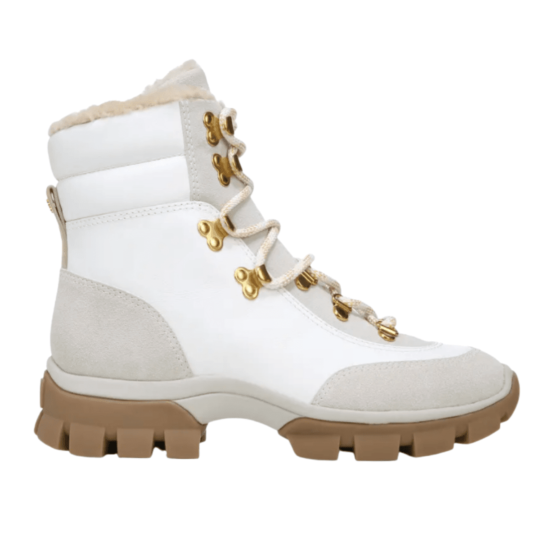 Designer winter boots by Veronica Beard — These lace up winter white and tan boots have a shearling lining for warmth and insulation in the cold season.