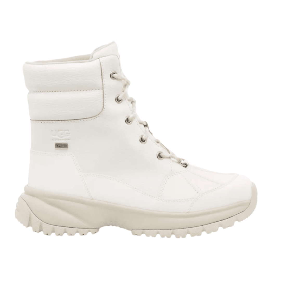 Snow white waterproof UGGS with lace-up ties and deep traction on the feet to reduce or eliminate slipping. These white boots can be found at Nordstrom.