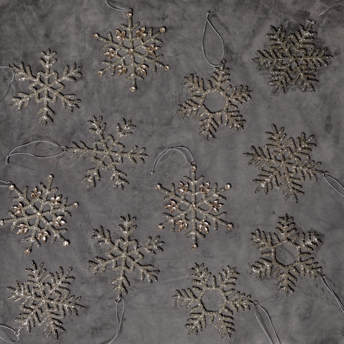 Delicate snowflake ornaments for a winter wonderland Christmas Tree