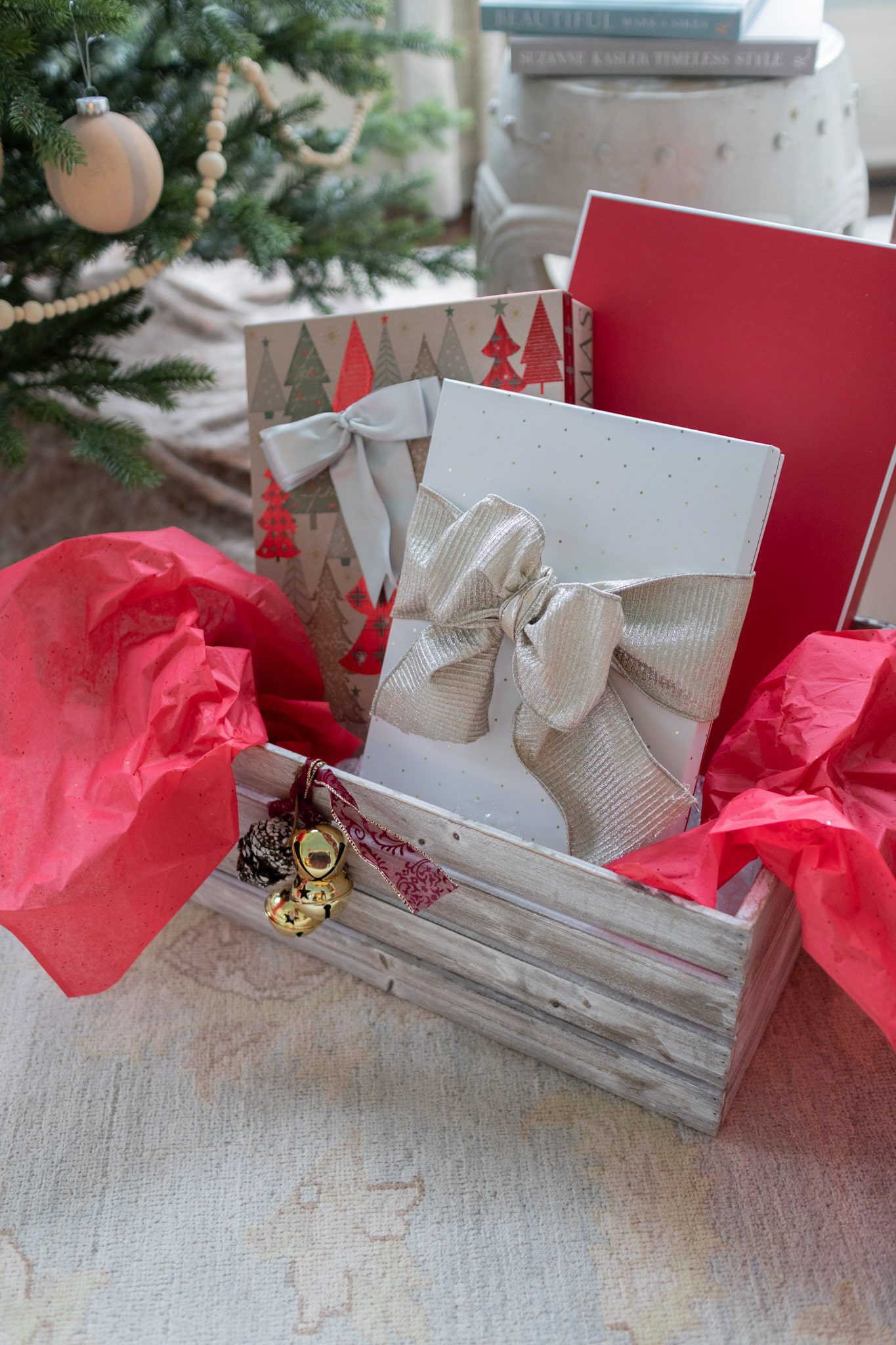 Create those red accents with red gifts and ribbons under the tree.