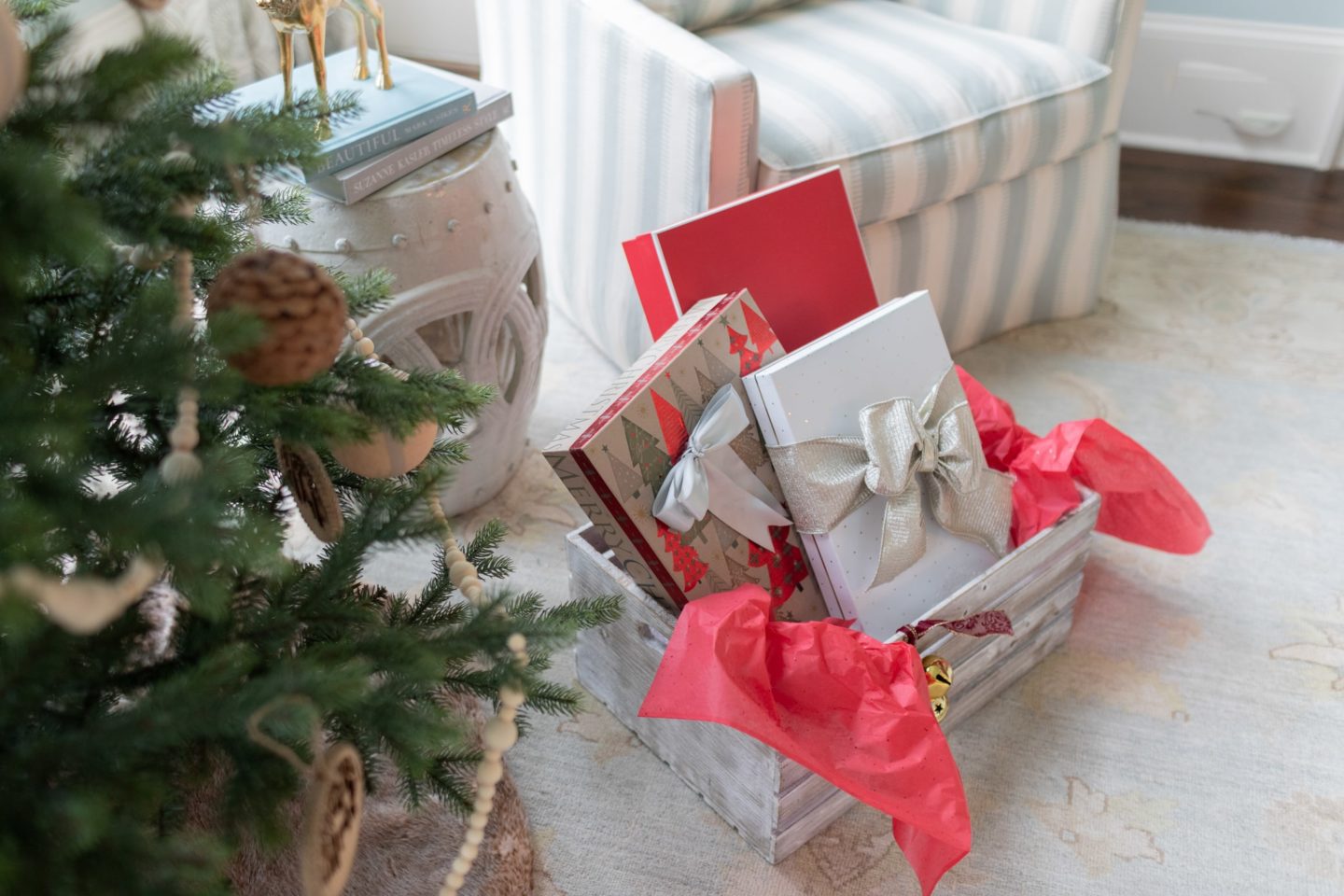 Rustic wrapped gifts under the wooden Christmas tree