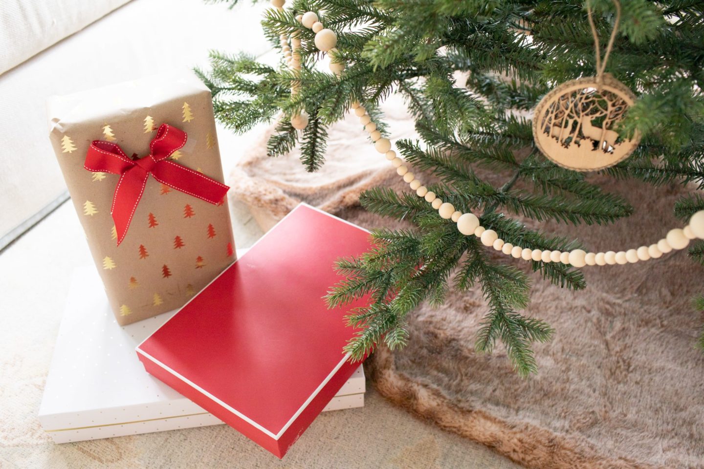 Add that final touch of red under the rustic tree with some red wrapping paper.