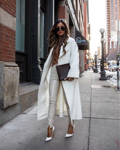 White leather leggings and white pumps.