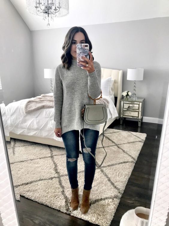 Gray sweater and distressed jeans