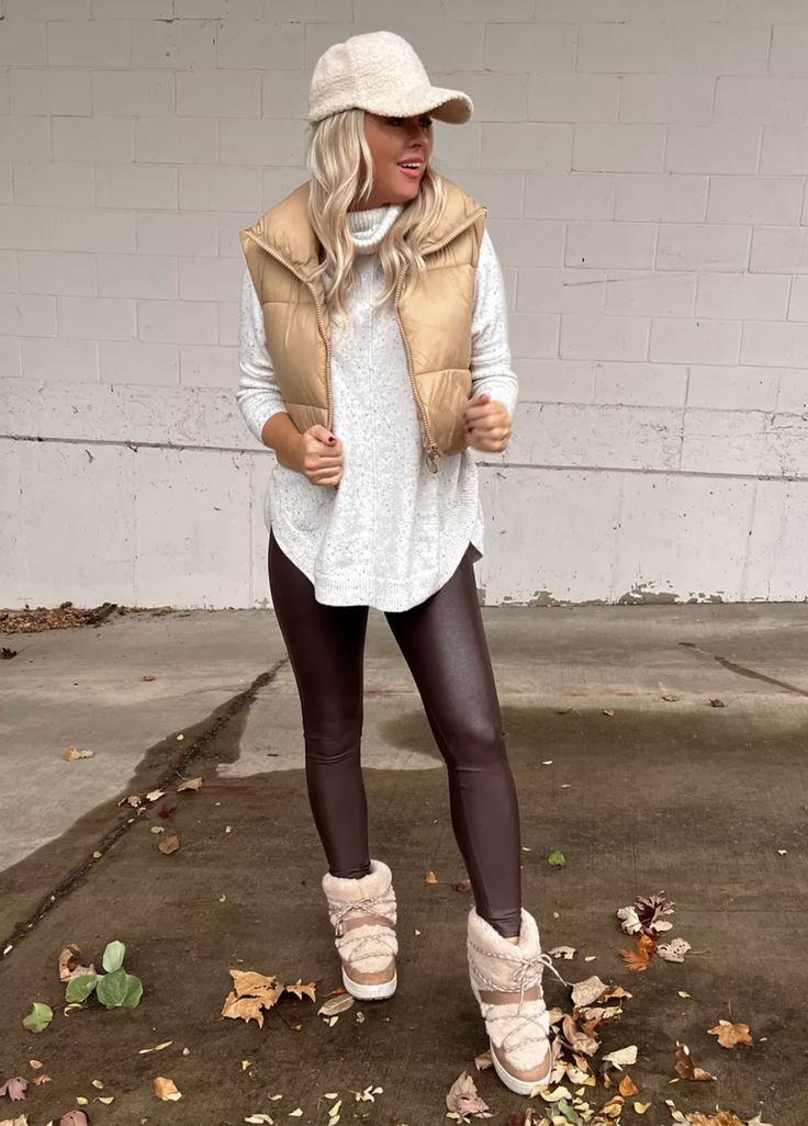 Ugg boots and brown leather leggings.